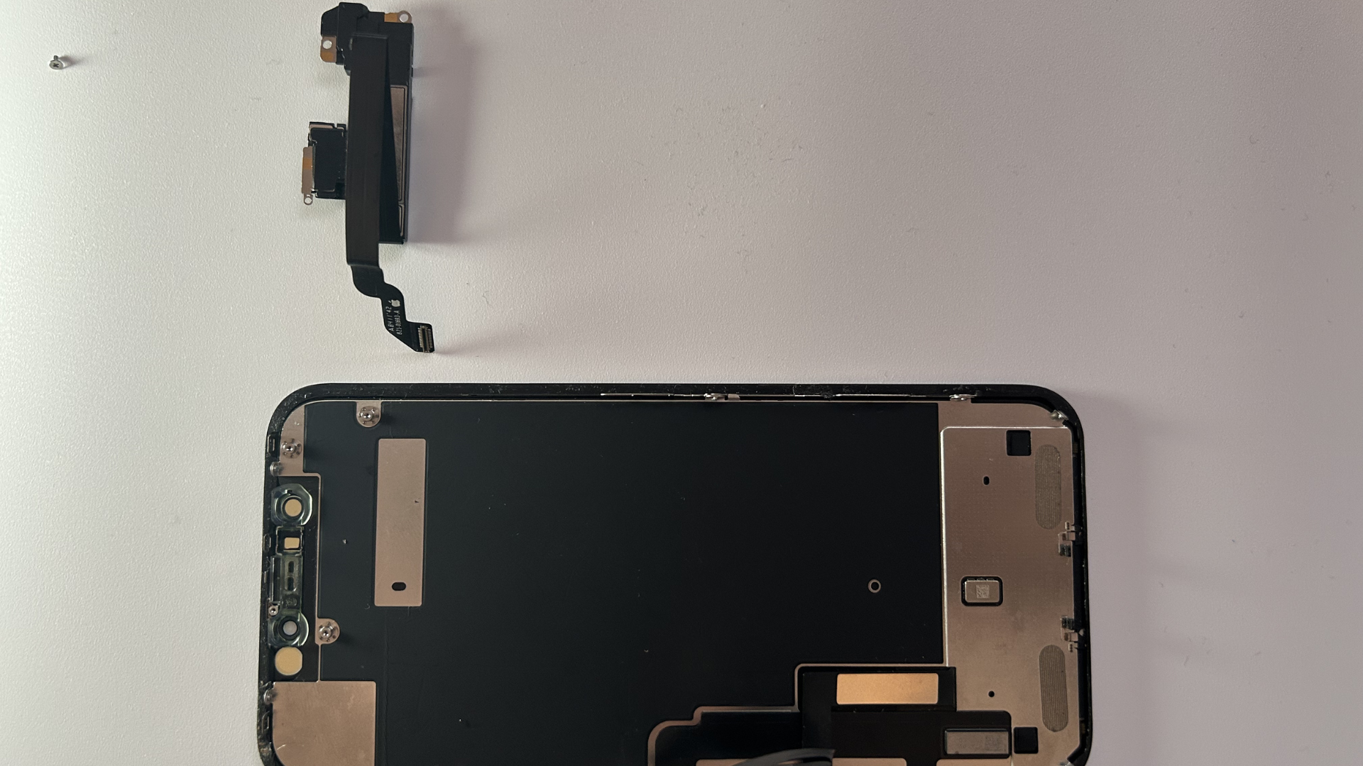 Ear speaker separated from the screen