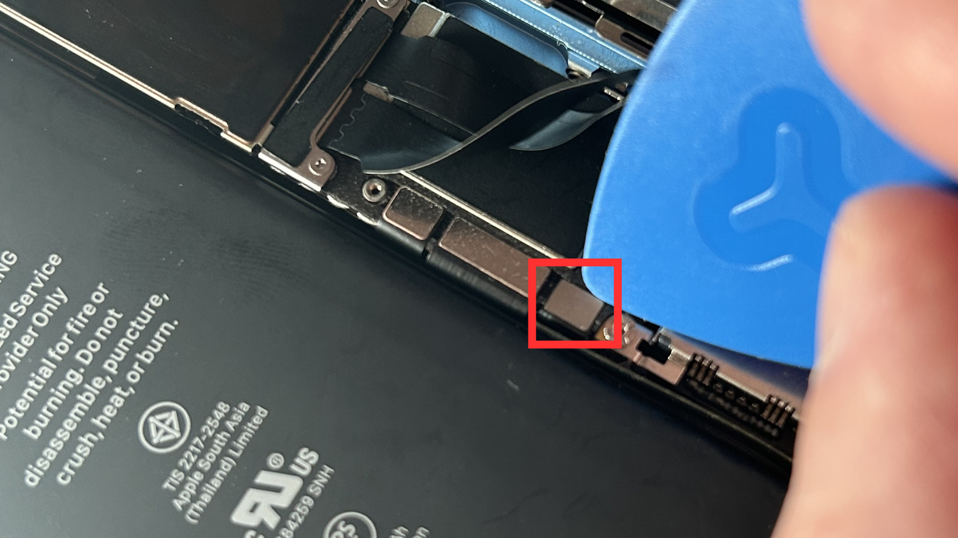 Close-up of the iPhone battery connector