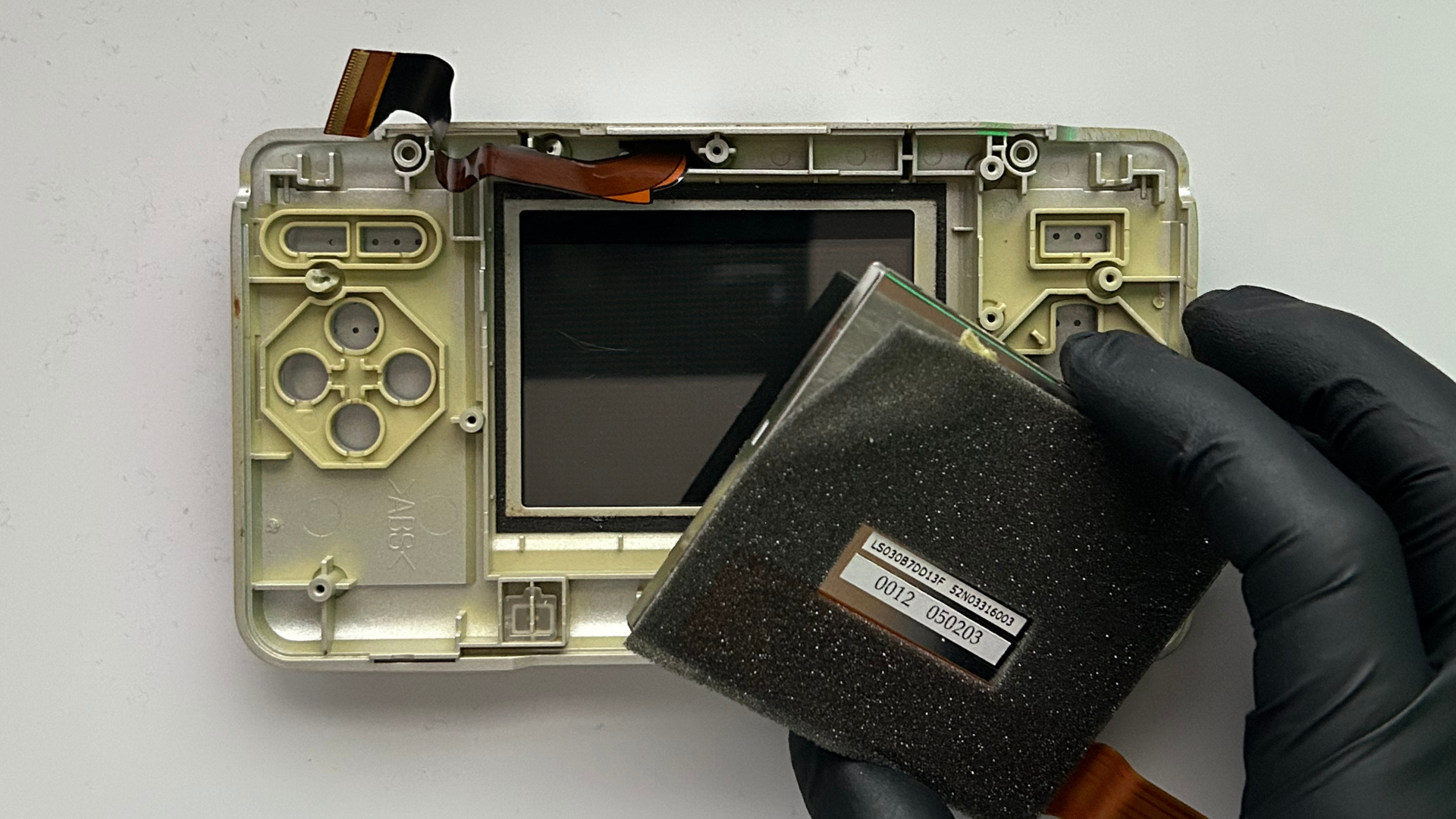 Original Nintendo DS bottom LCD removed from the lower shell