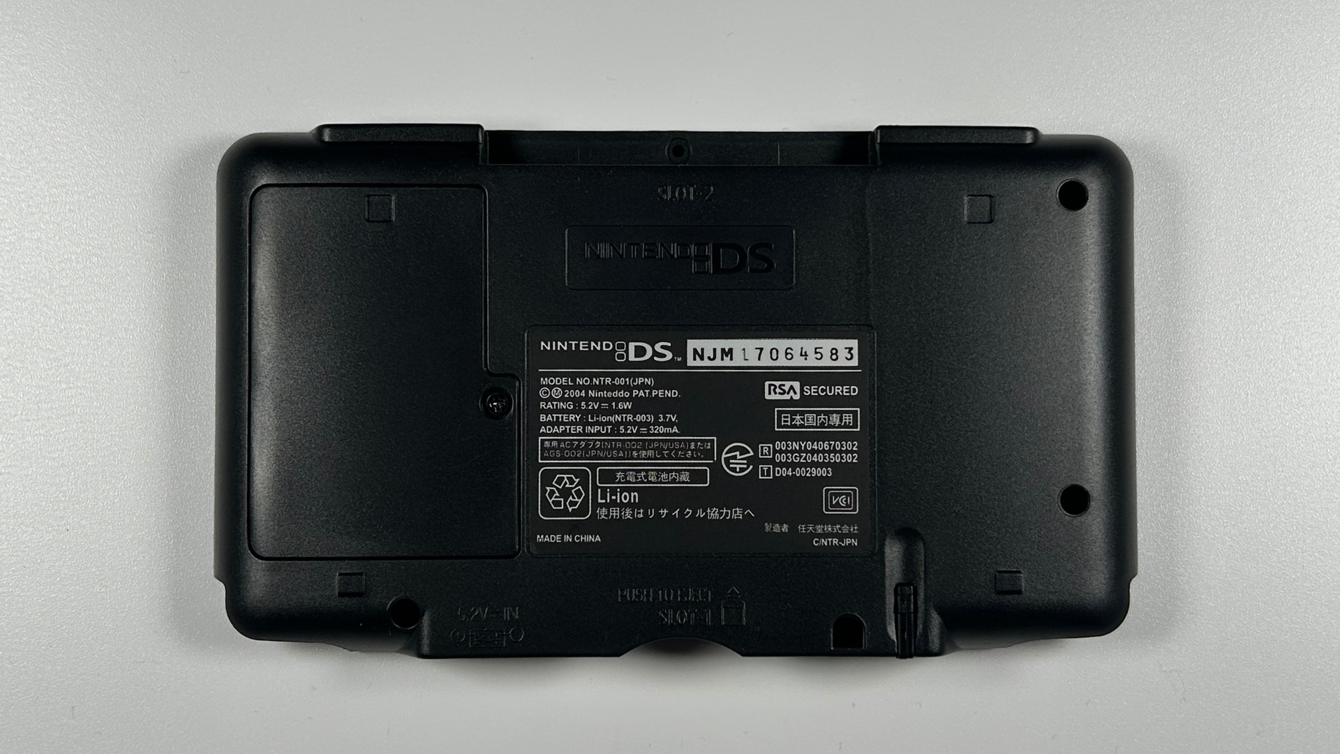 Nintendo DS replacement shell with stickers and trim pieces installed