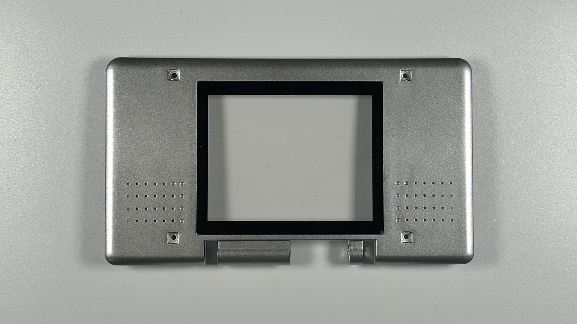 Nintendo DS replacement shell with stickers and trim pieces installed