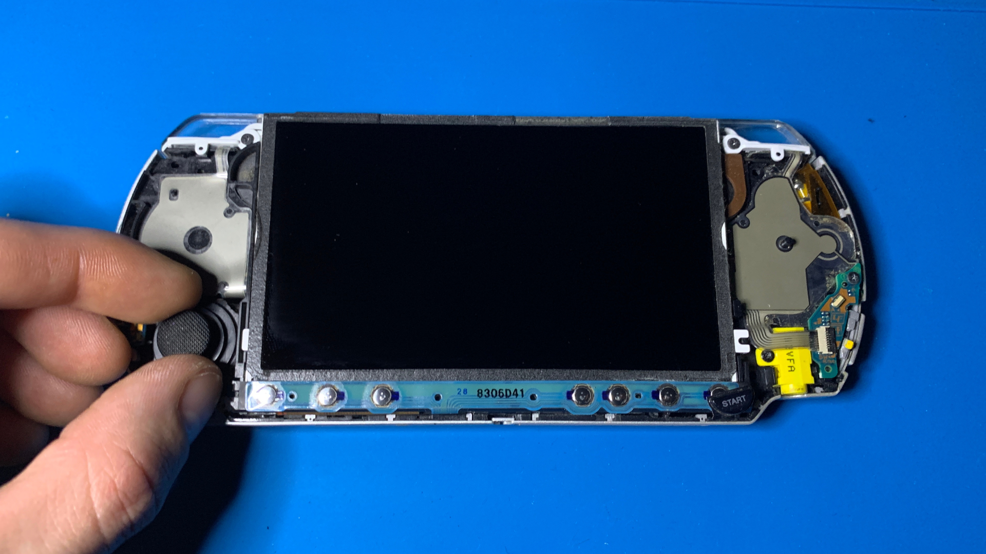 Close-up of PSP 2000 front button flex cable