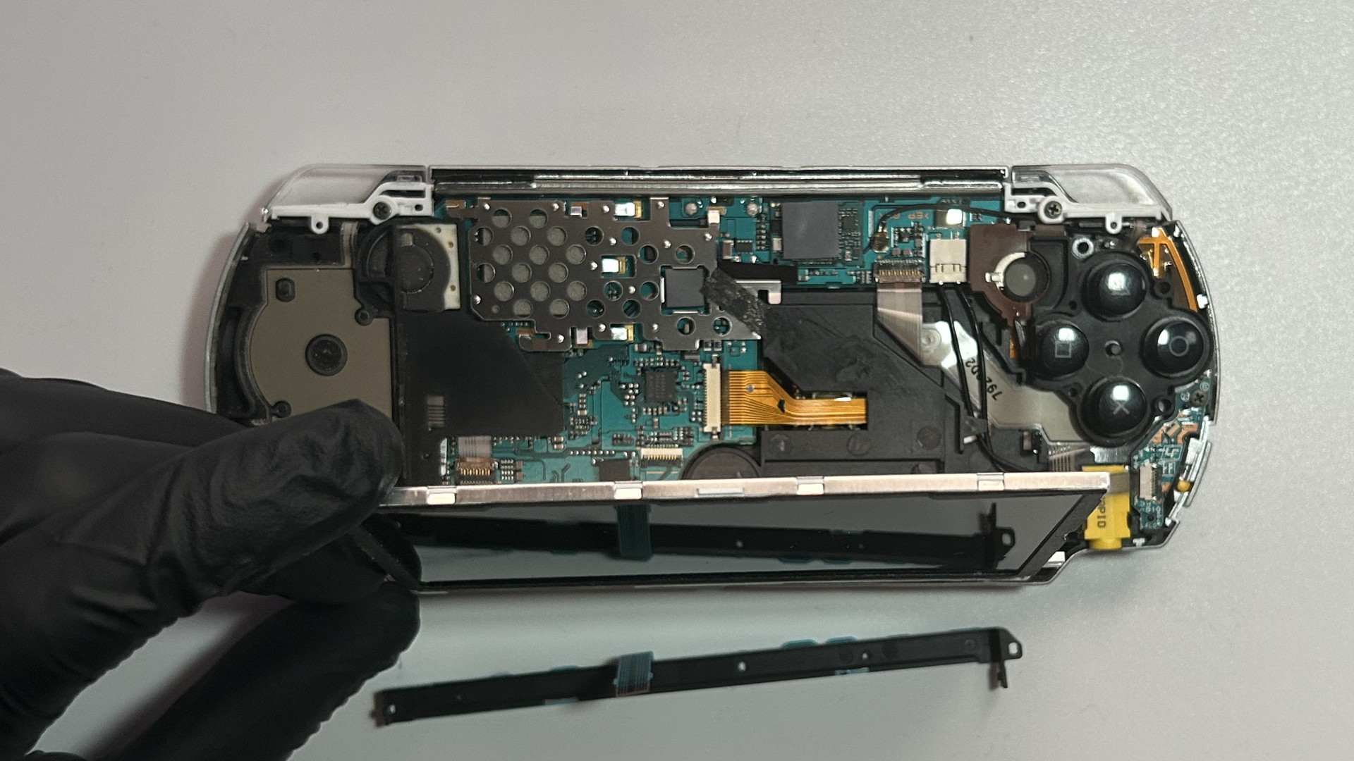 LCD being lifted from the top edge