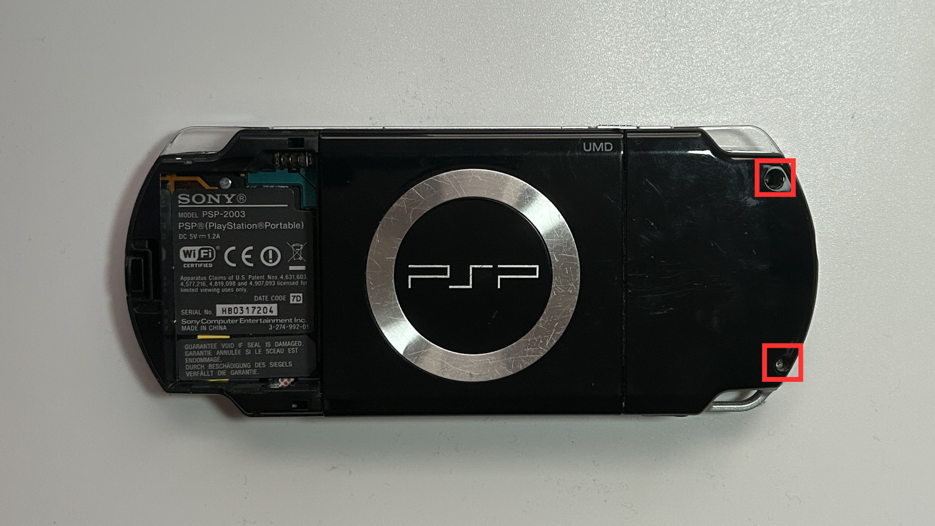 Close-up of screws on the back of the PSP 2000