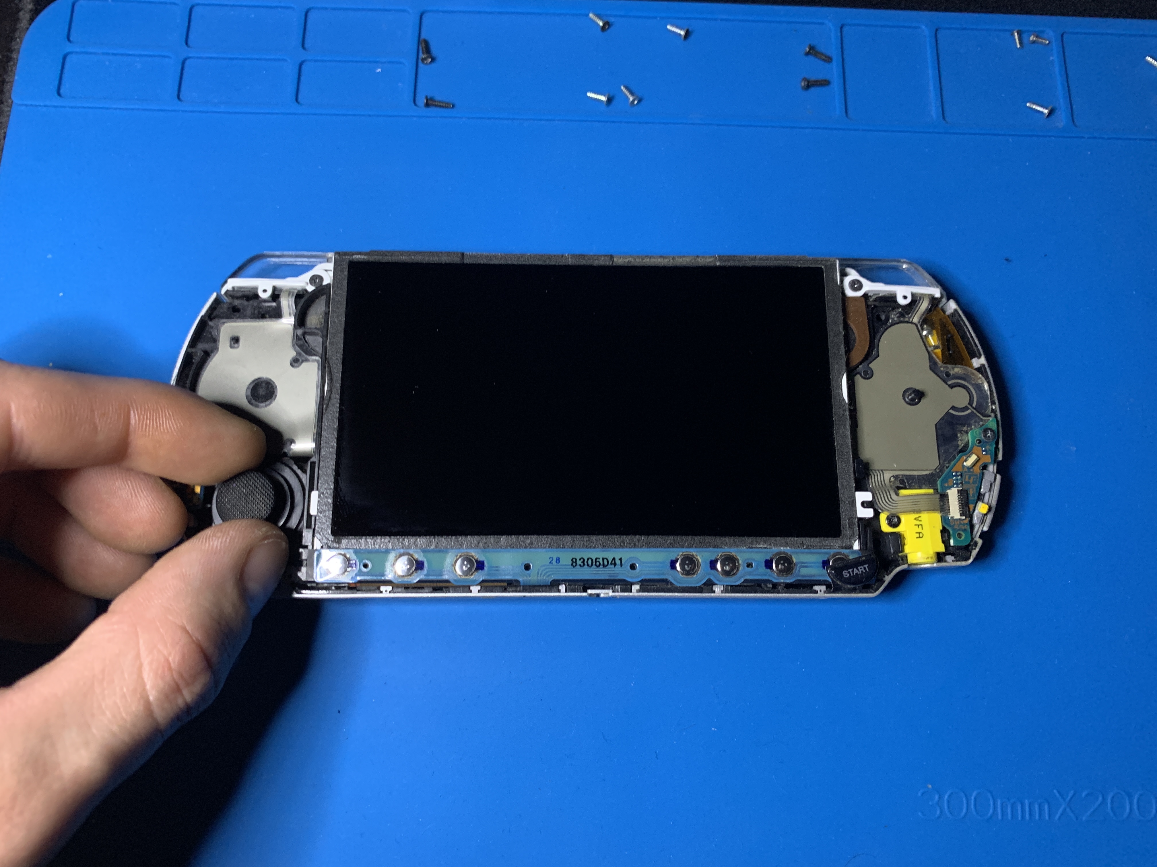 Close-up of PSP 2000 front button flex cable